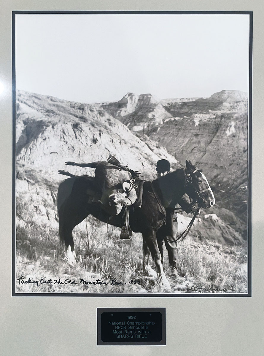 This photograph, Packing Out the Mountain Ram, was awarded to me by John Schoffstall of C. Sharps Arms Co., at the awards banquet at the 1992 BPCR National Championship.